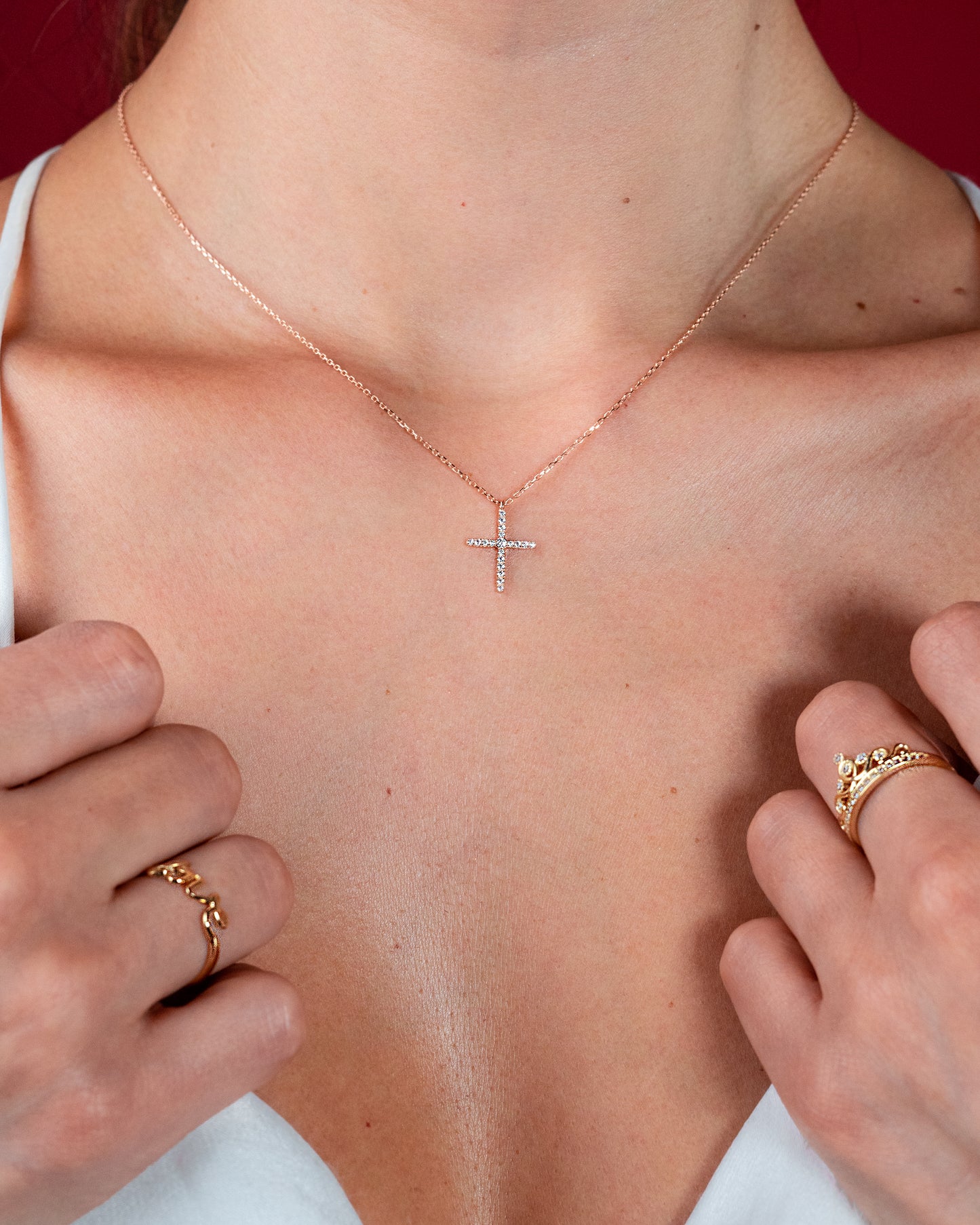 Dije Cruz oro italiano rosa 14K con zirconias