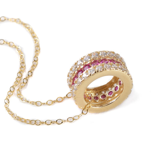 Dije circular oro italiano 14K con zirconias rojas y blancas